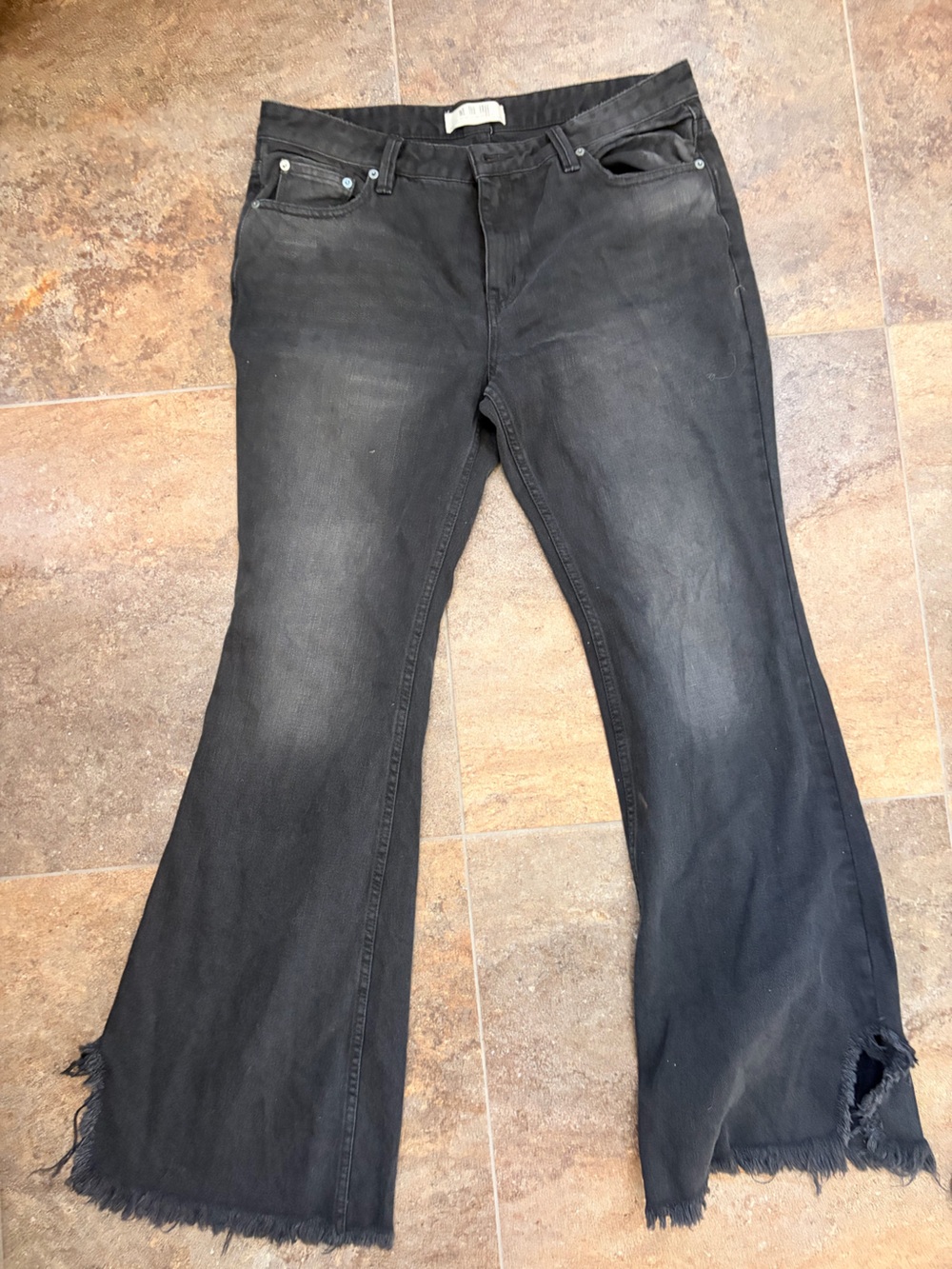 We The Free Black Washed Flare Jeans with Raw Hem